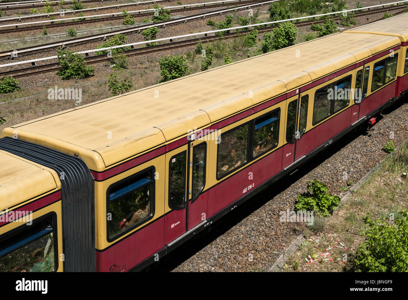 Berlin, Germany - may 27, 2017: S-Bahn train on multi lane rail / railroad network at Berlin Olympiastadion ( olympic Stadium). Stock Photo