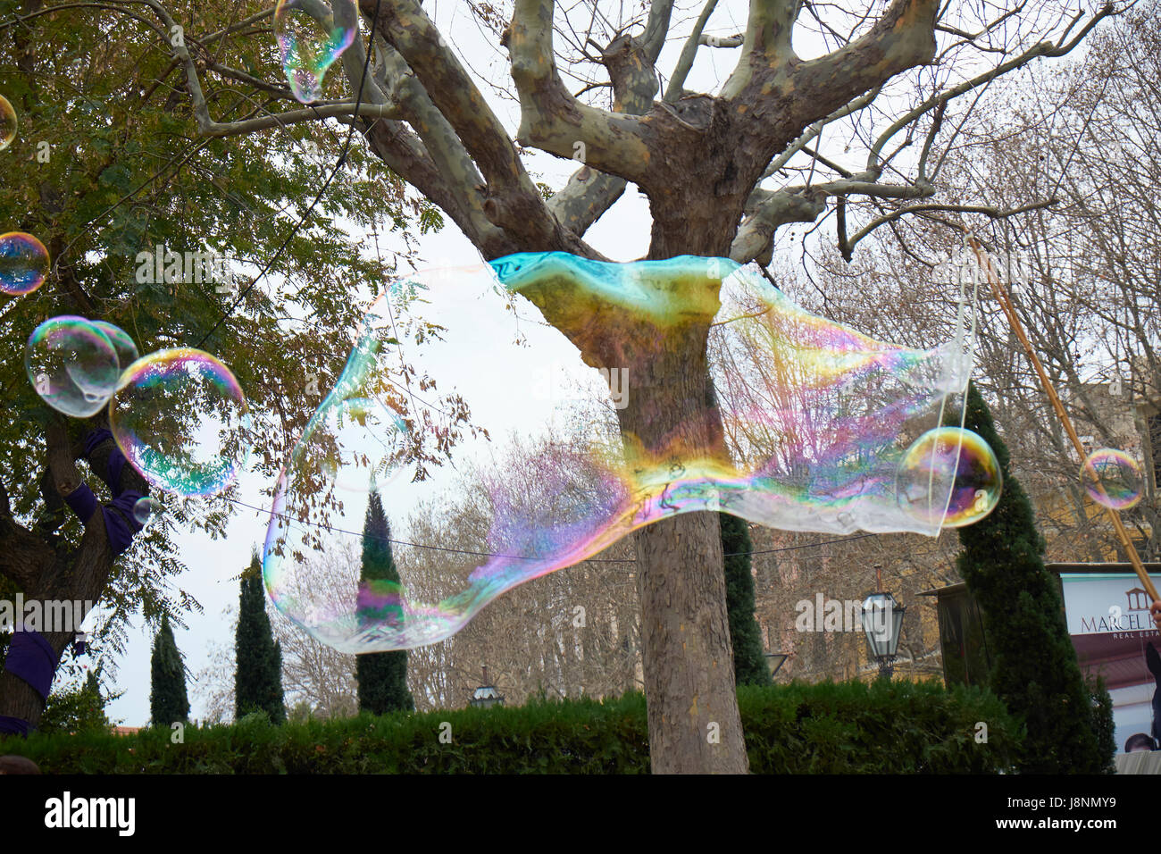 big soap bubble of an street artist,,Palma de Mallorca,Mallorca,Spain Stock Photo
