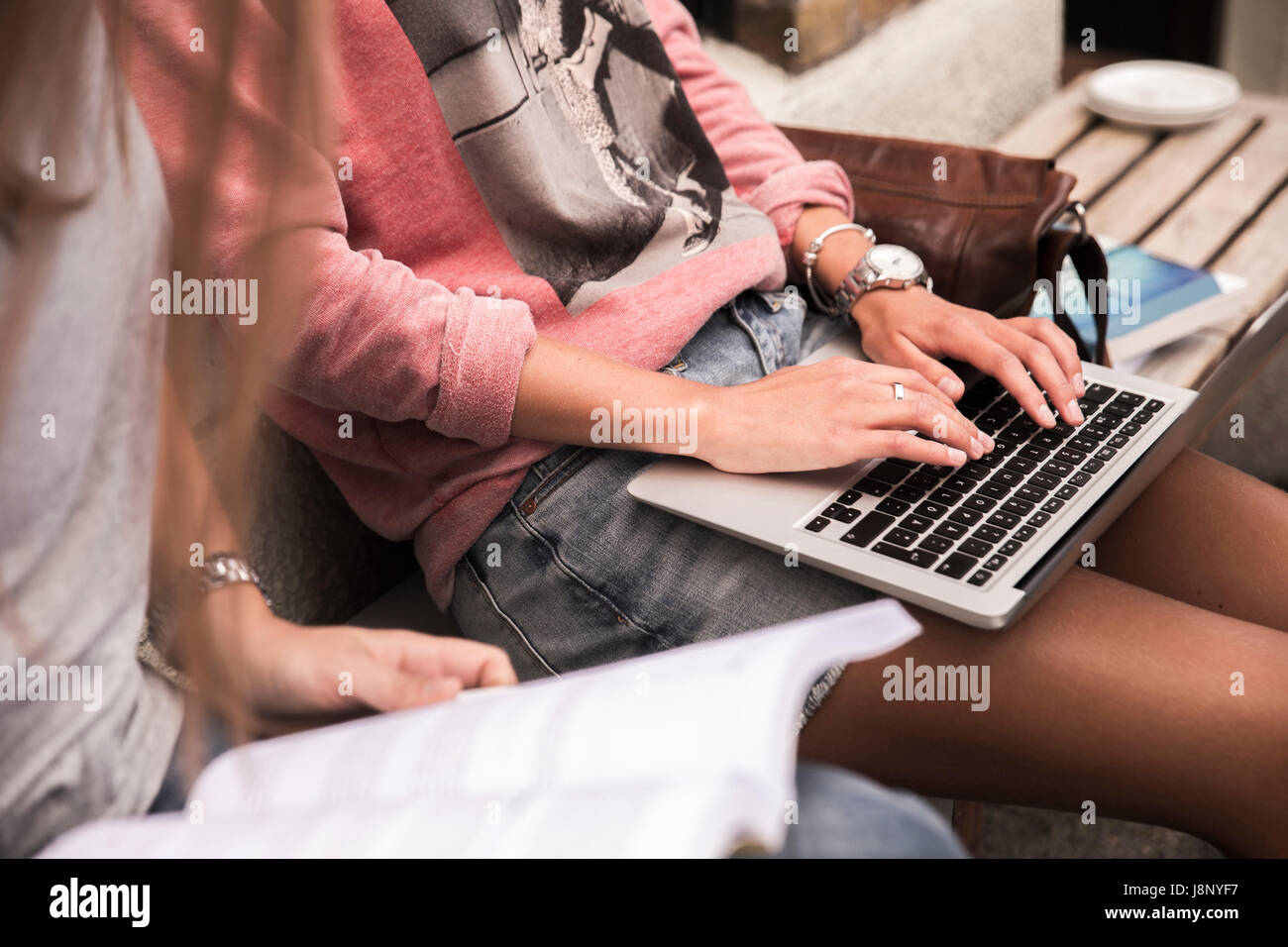 Young women studying and using laptop Stock Photo