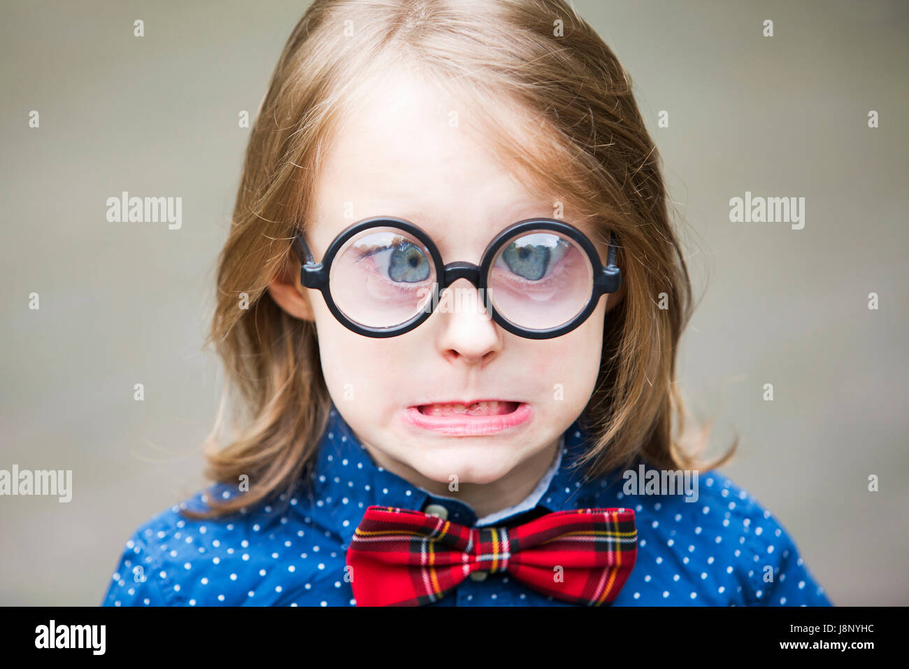 Young blonde boy with glasses smiling hi res stock photography and images Alamy
