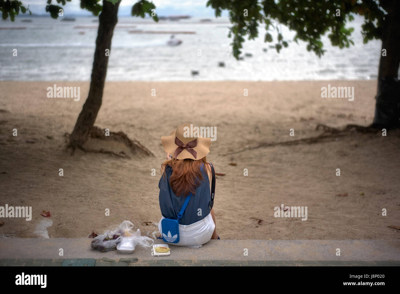 Woman rear view outside alone hi-res stock photography and images - Alamy