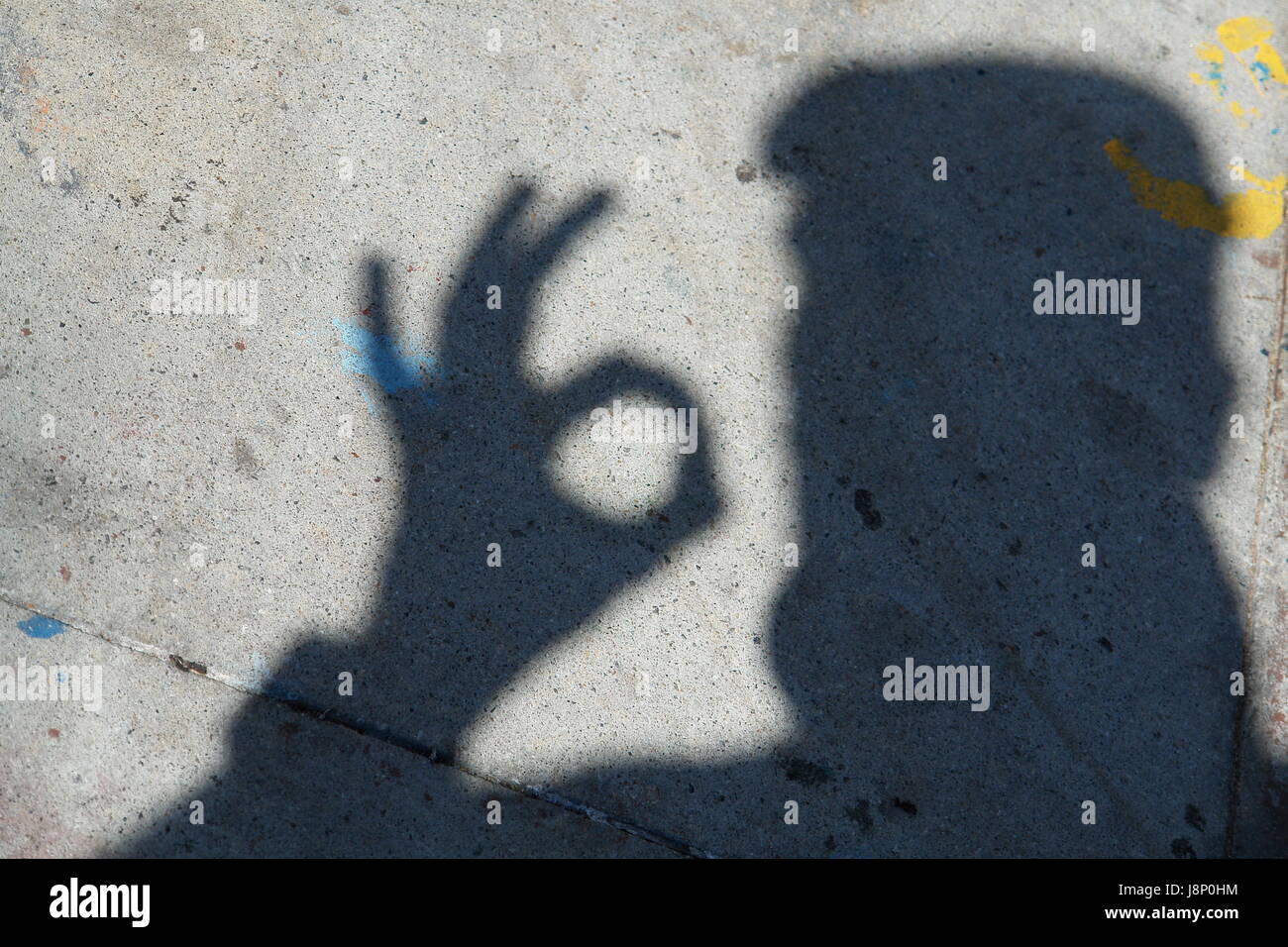 OK sign gesture in a shadow Stock Photo