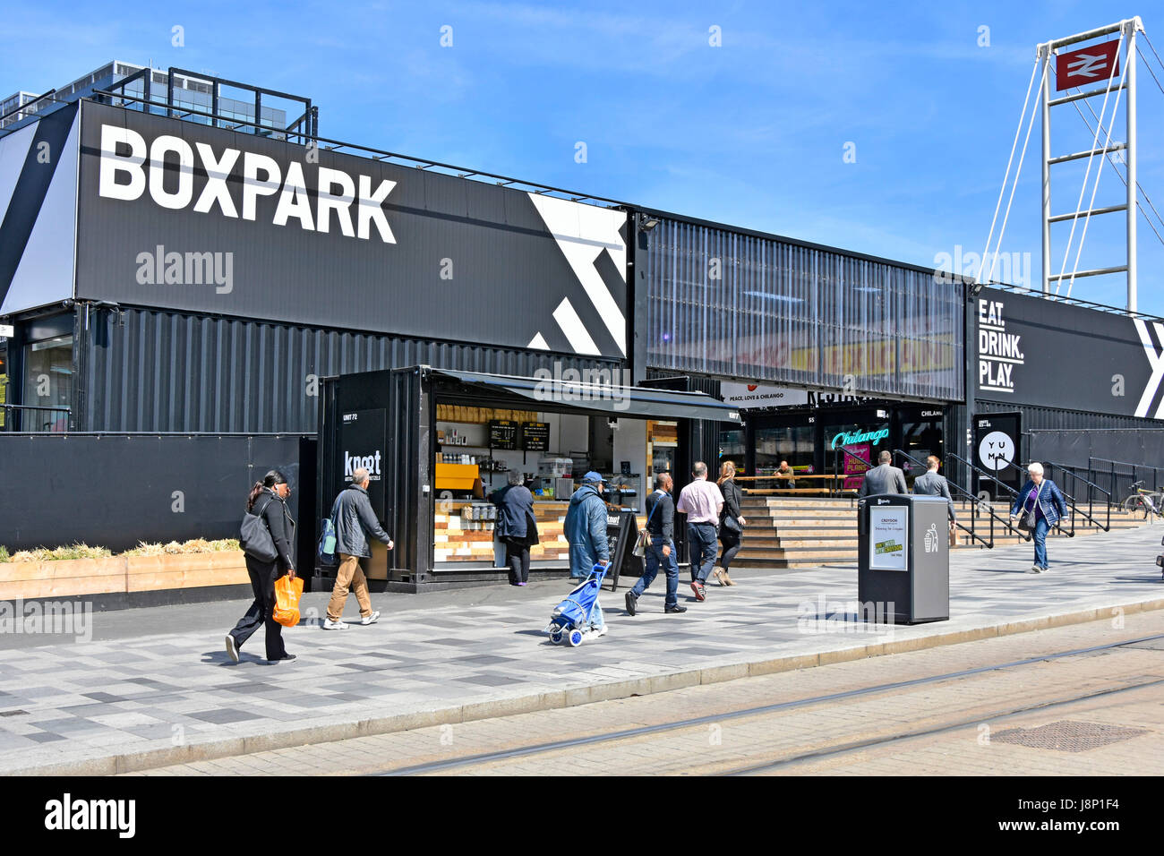 Croydon UK Boxpark exterior & entrance to 96 shipping containers providing retail & restaurant space beside East Croydon train station and tram stop Stock Photo