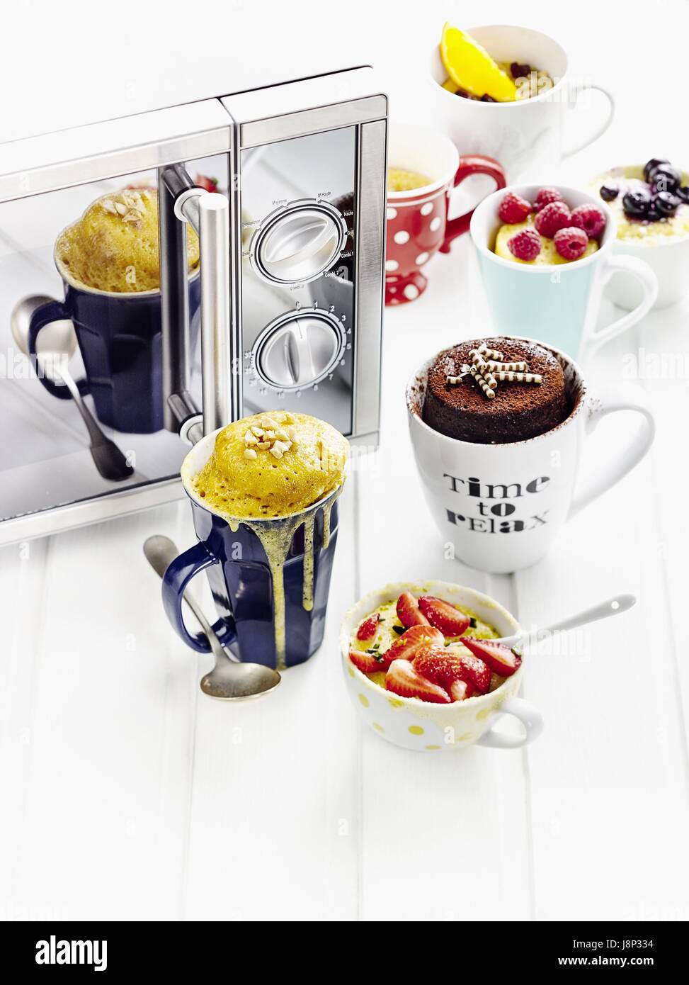 Mug cake variations (microwave Stock Photo Alamy