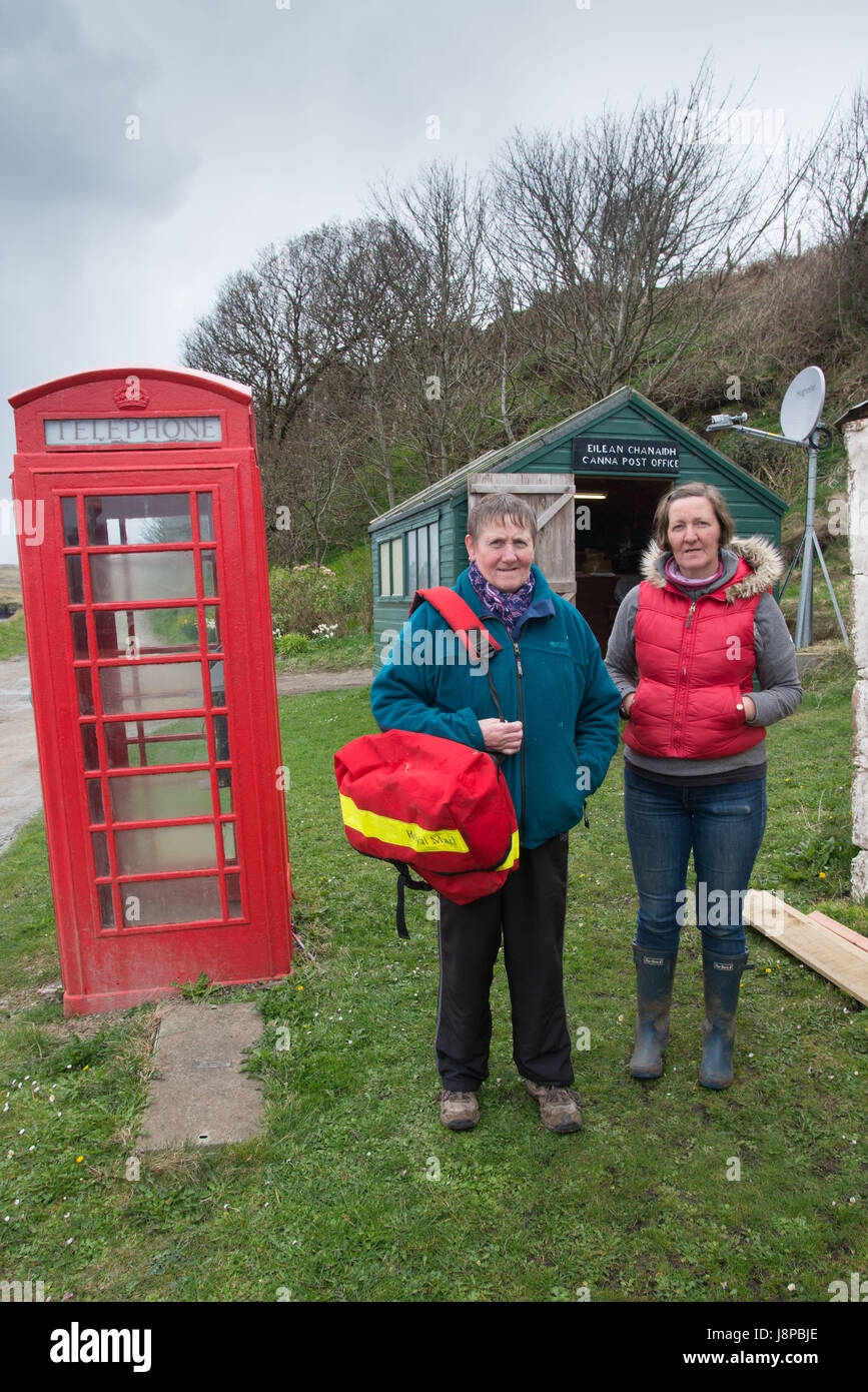 Winefride MacKinnon (left) and her sister Ishbel outside the post office on the Island of Canna, inner Hebrides  Scotland Stock Photo