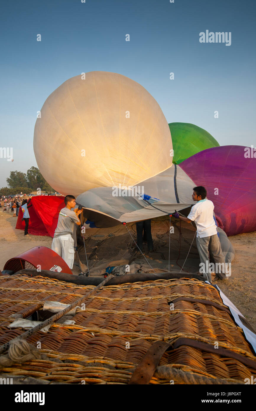 Crews prepare hot air balloon cold inflation before fly in hot air Thailand International Balloon Festival 2009 Stock Photo