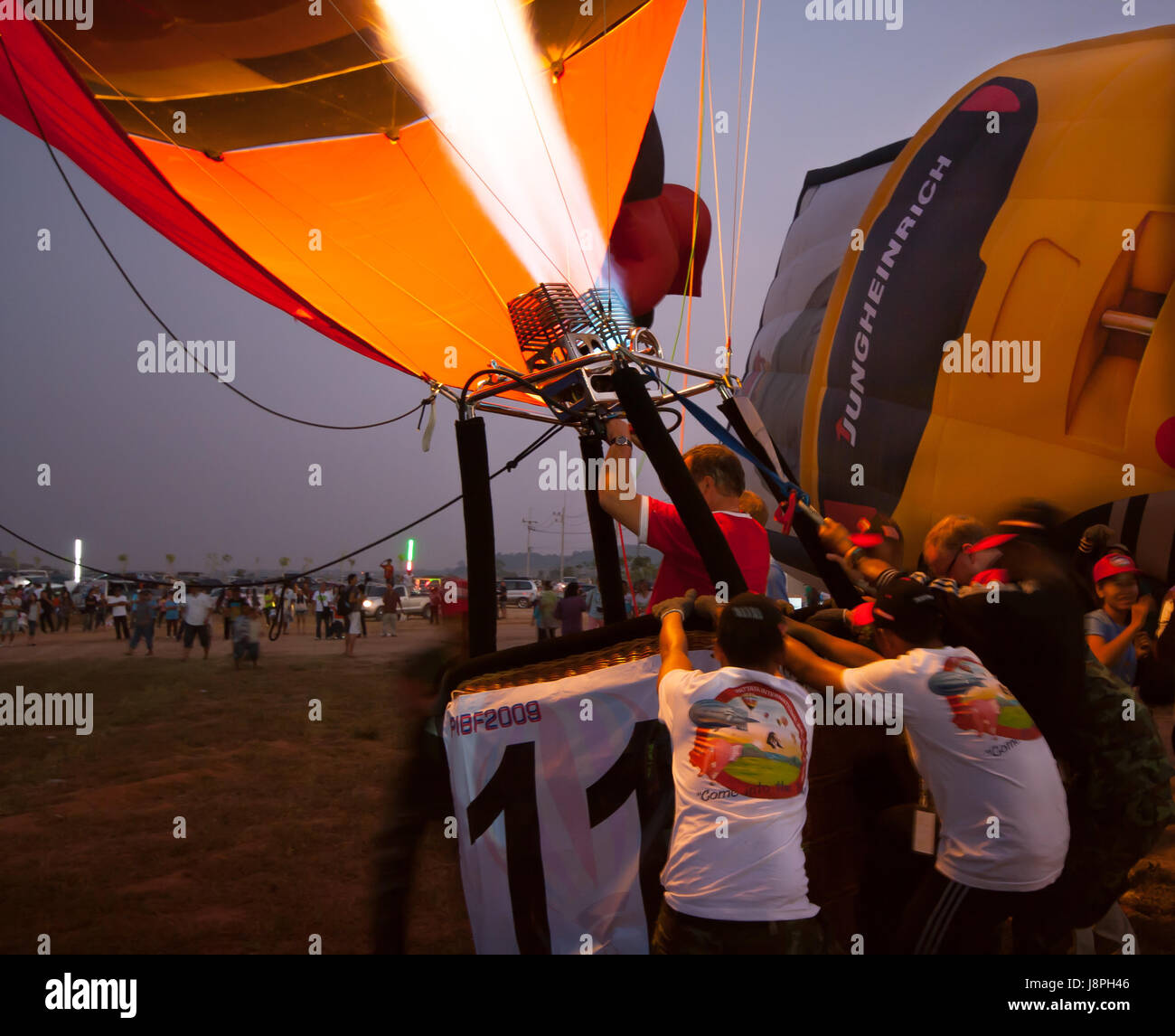 Pilot heat to inflate the balloon before fly in hot air Thailand