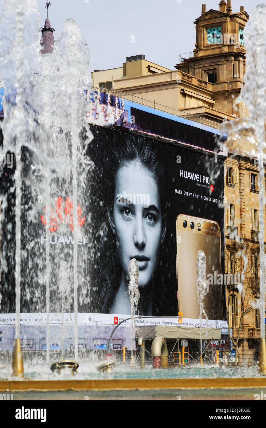 Massive advertising screen on scaffolding for Huawei mobile phone, Barcelona, Catalunya, Spain Stock Photo