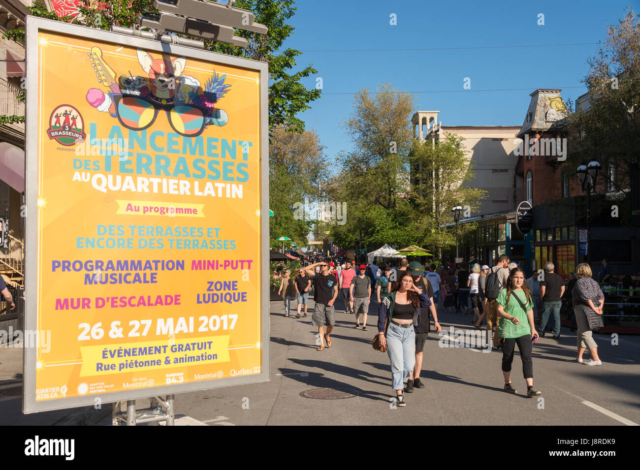 Montreal, CA - 27 May 2017: St-Denis street is turned into a pedestrain zone during 'Terrasses au Quartier Latin' event Stock Photo