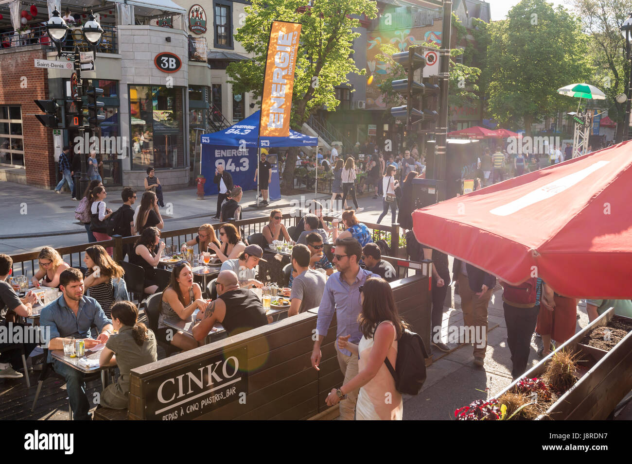 Montreal, CA - 27 May 2017: St-Denis street is turned into a pedestrain zone during 'Terrasses au Quartier Latin' event Stock Photo