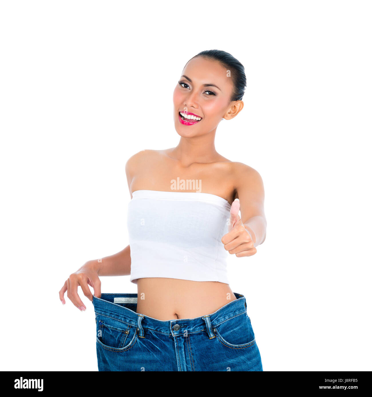 Young Asian woman losing weight by living healthy Stock Photo Alamy
