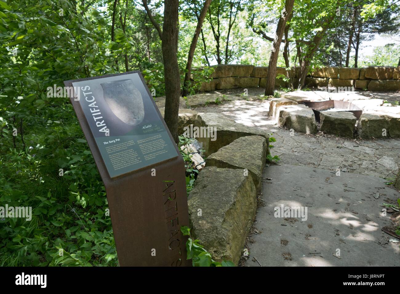 An educational sign about artifacts found in Spring Lake Park Reserve in Hastings, MN, USA. Stock Photo