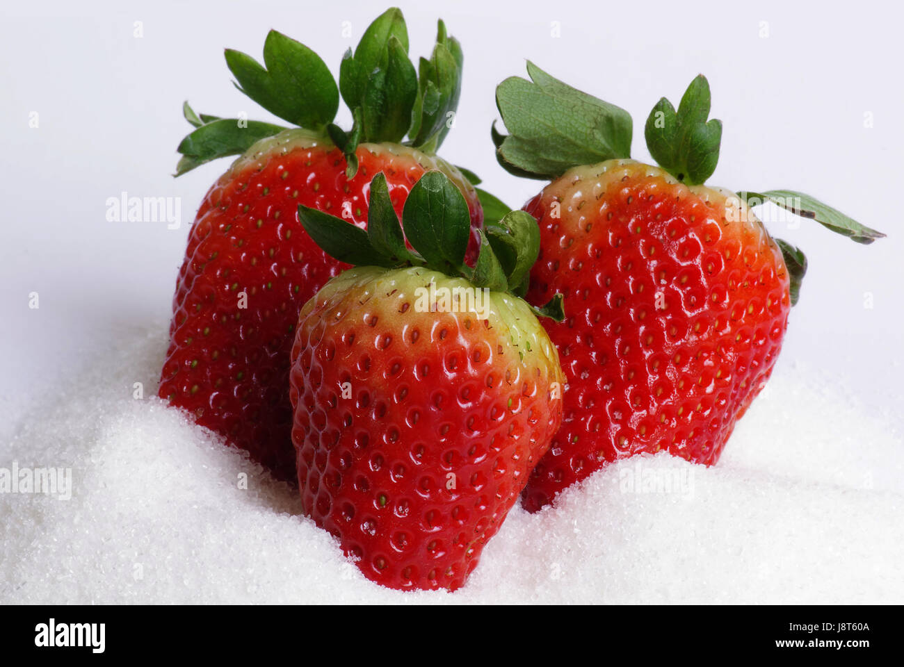 strawberries with sugar Stock Photo Alamy