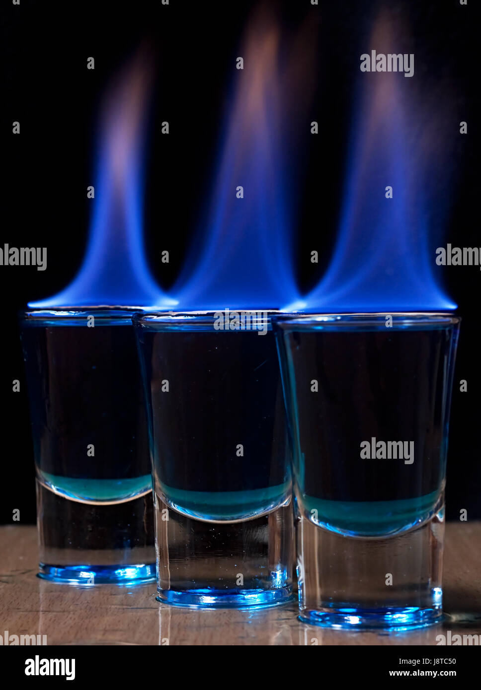 drink, drinking, bibs, alcohol, fire, conflagration, shot, lap, burn, blue Stock Photo Alamy
