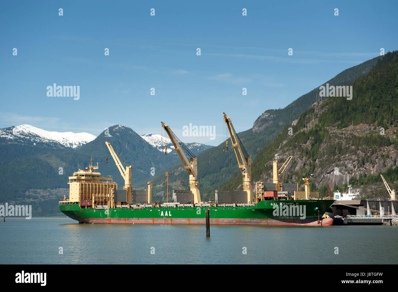 The cargo ship Aal Kembla loading up at the Squamish terminal freight dock.  Squamish BC, Canada. Stock Photo