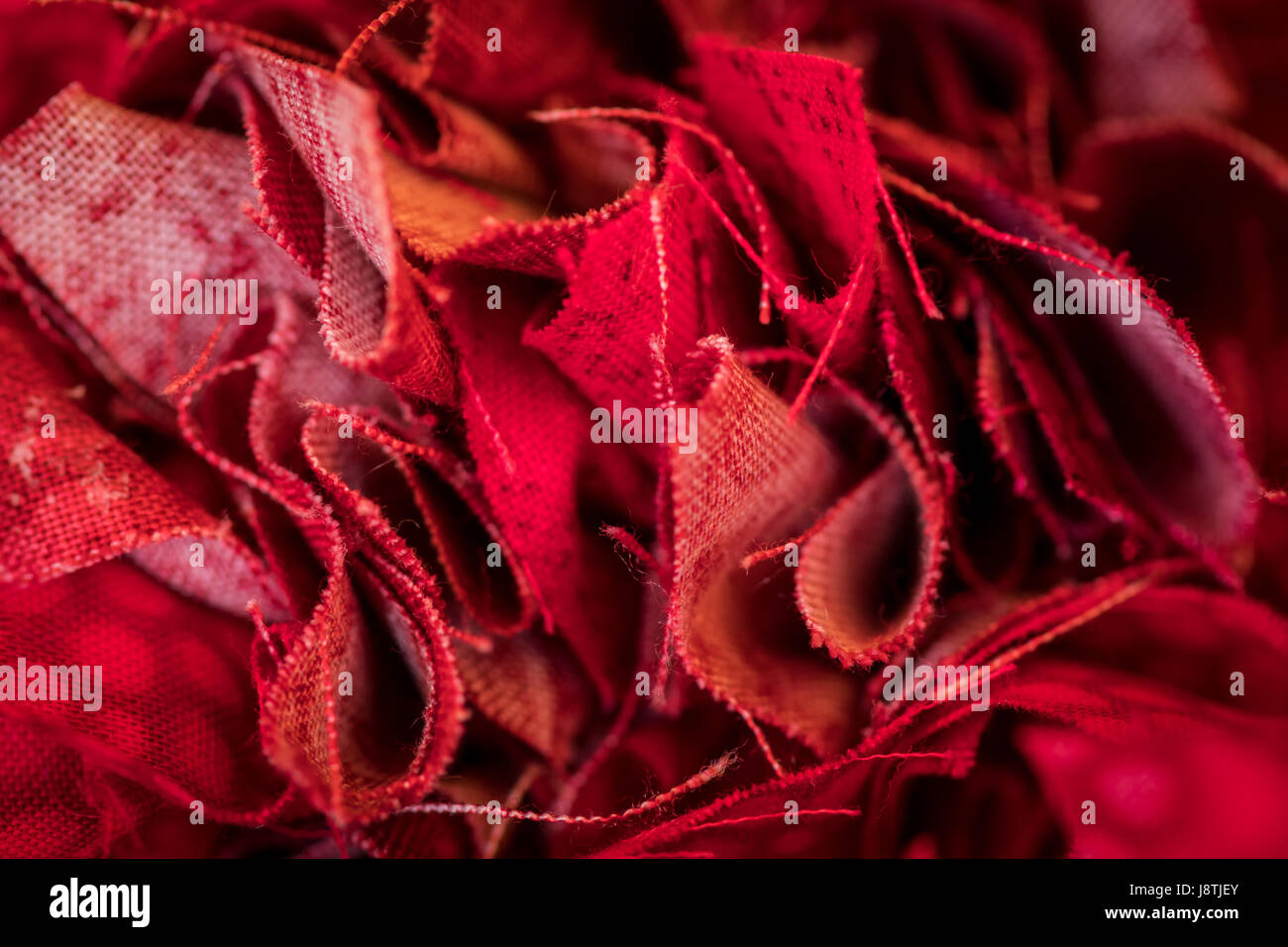 Bunched Edges of Red Fabric in close up shot Stock Photo Alamy