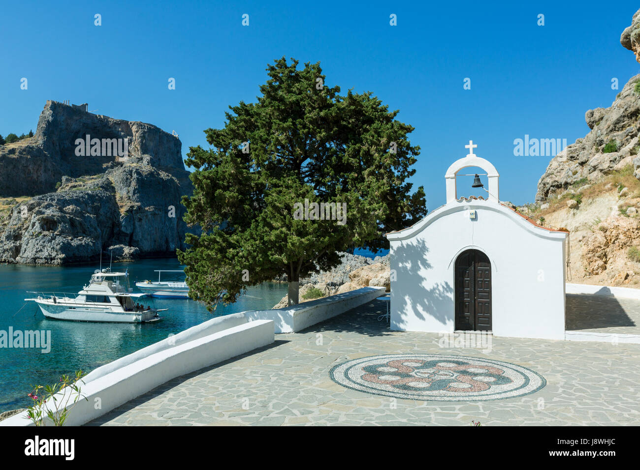 St Paul's church in a St Paul's bay in Lindos , Rhodes, Greece Stock ...