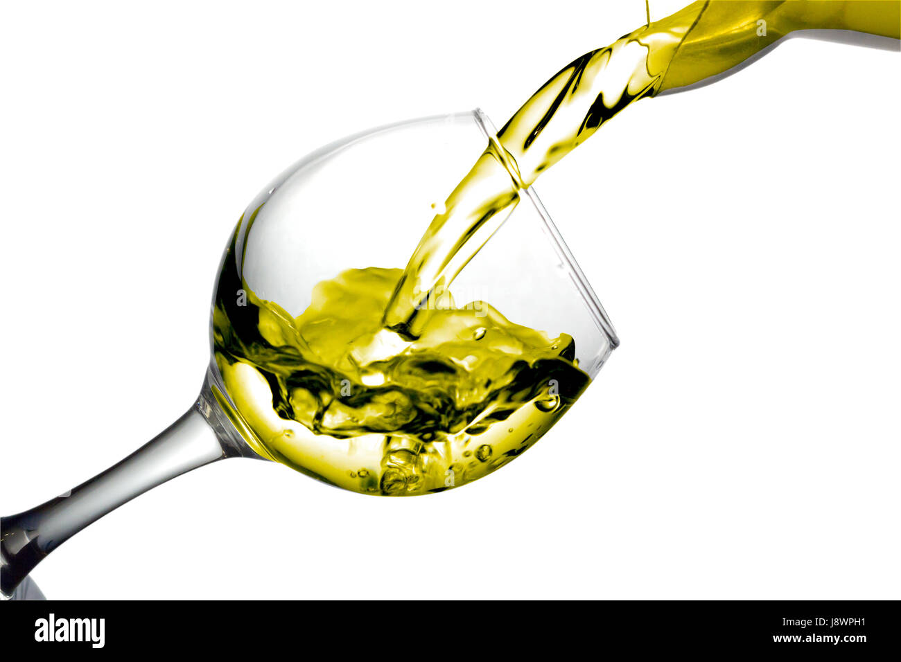 Yellow liquid, water, apple juice, white wine pouring into a glass, liquid  in a speaker, isolated on a white background Stock Photo - Alamy