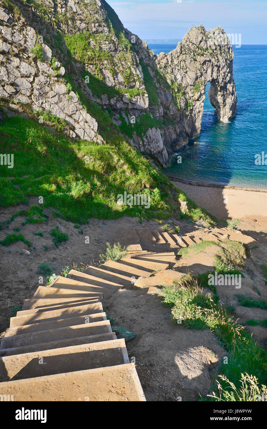 England, Dorset, Durdle Door, Steps leading down to the beach and the arch. Stock Photo