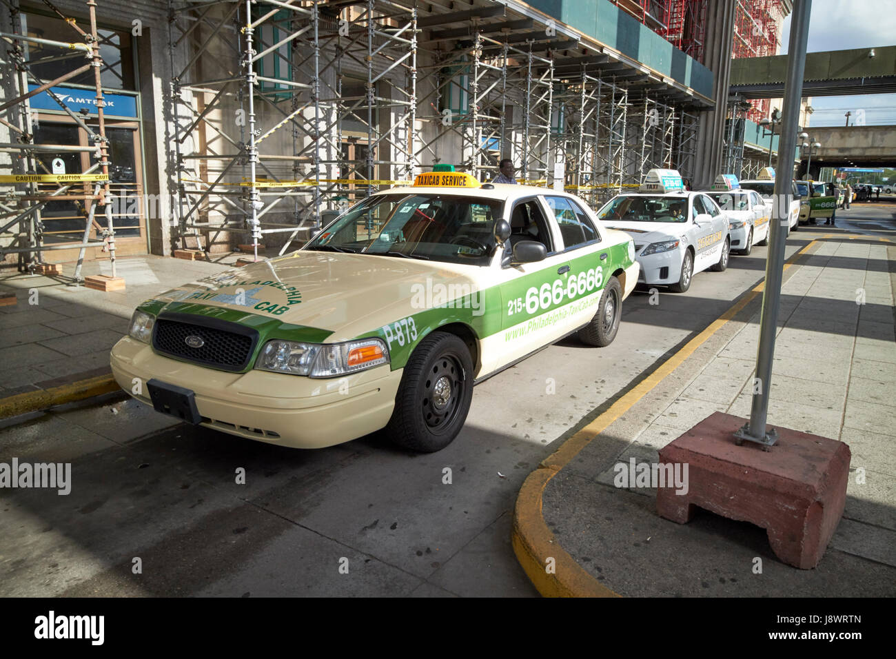 Philadelphia taxi cab rank outside 30th street station USA Stock Photo