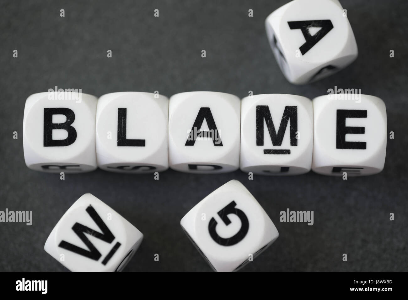 word-blame-on-white-toy-cubes-J8WXBD.jpg