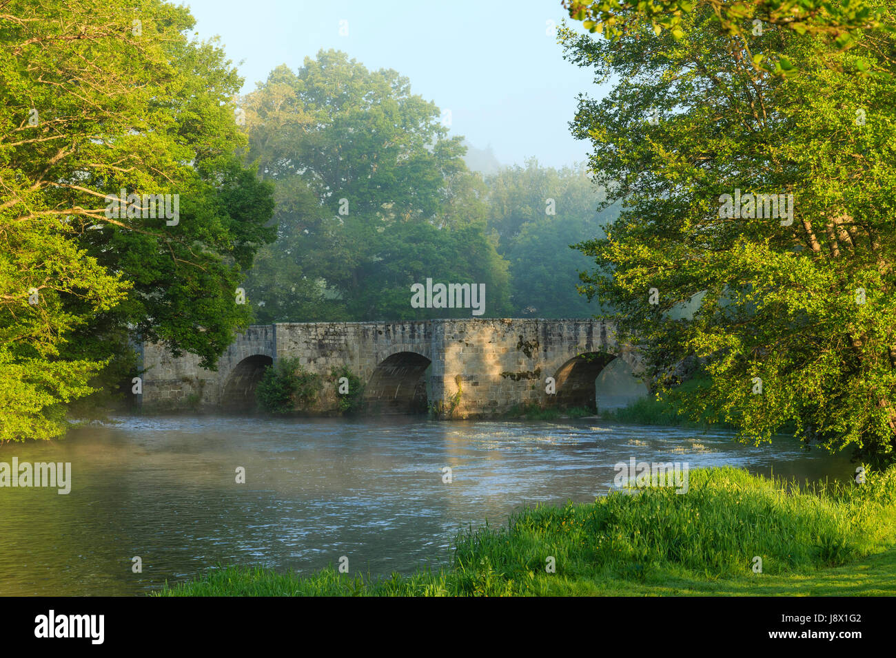 France, Creuse, Moutier-d'Ahun, romanesque bridge over the Creuse Stock Photo