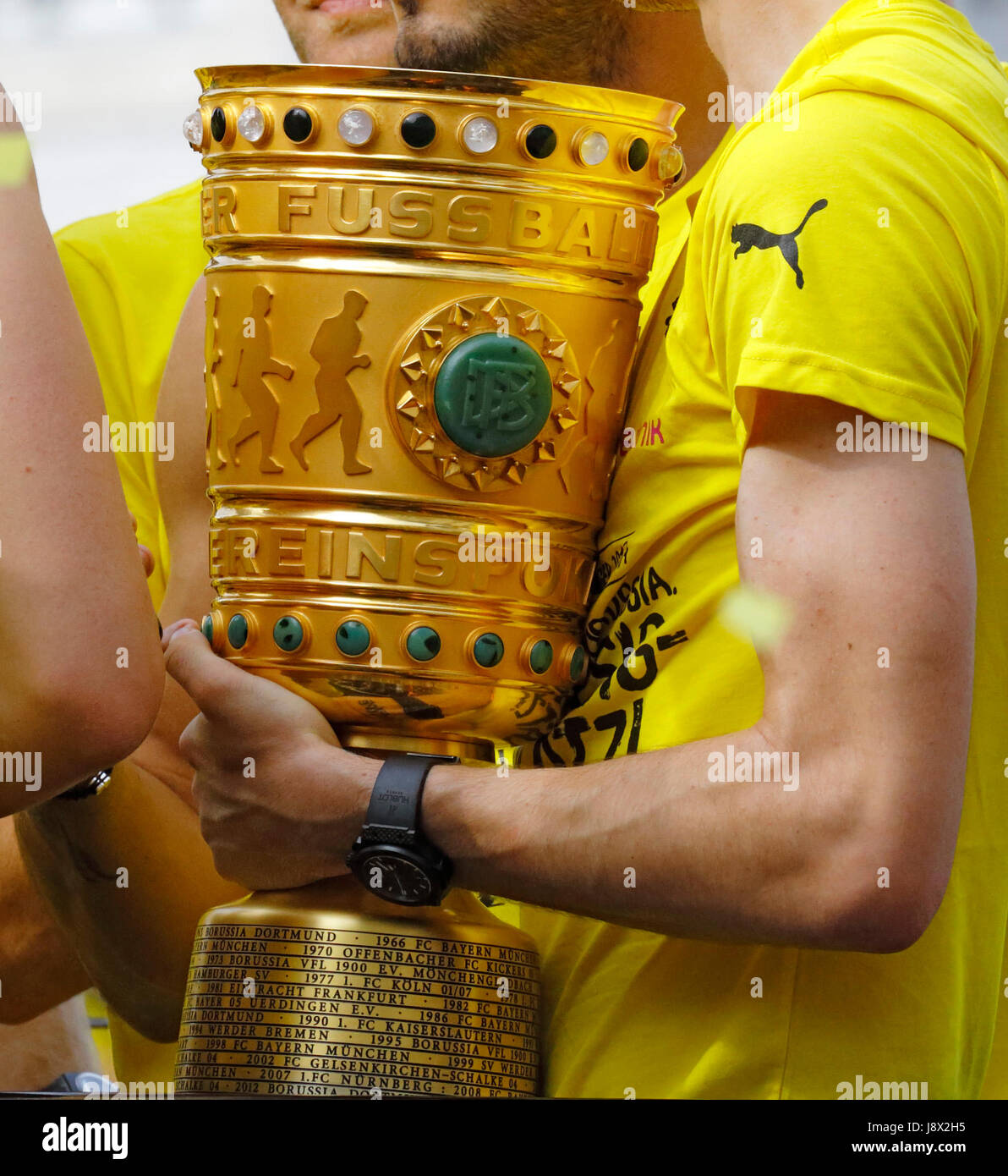 sports, football, Bundesliga, DFB Cup, 2016/2017, BVB Borussia Dortmund became German cup winner 2017 in the final against Eintracht Frankfurt and qualified for the UEFA Champions League 2017/2018, motorcade with the BVB team to the Dortmund downtown and to the Borsigplatz, prize cup Stock Photo