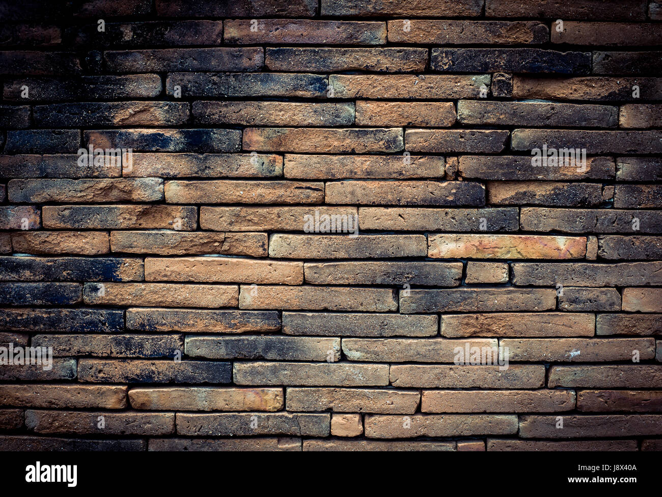 Old brick wall texture in a background image Stock Photo - Alamy