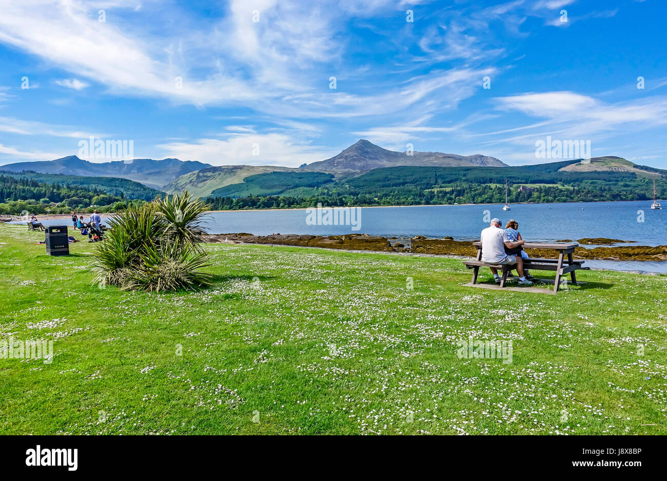 The promenade with Goat Fell and bay at Brodick Isle of Arran North Ayrshire Scotland UK Stock Photo