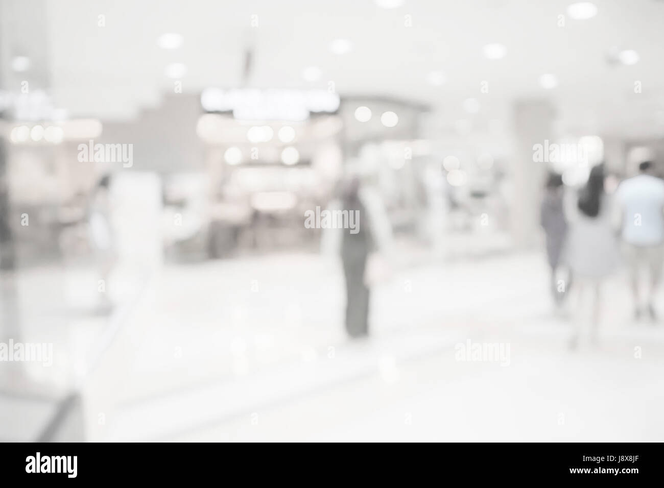 Blurred image background, people at shopping mall blur background with bokeh and vintage tone. Stock Photo