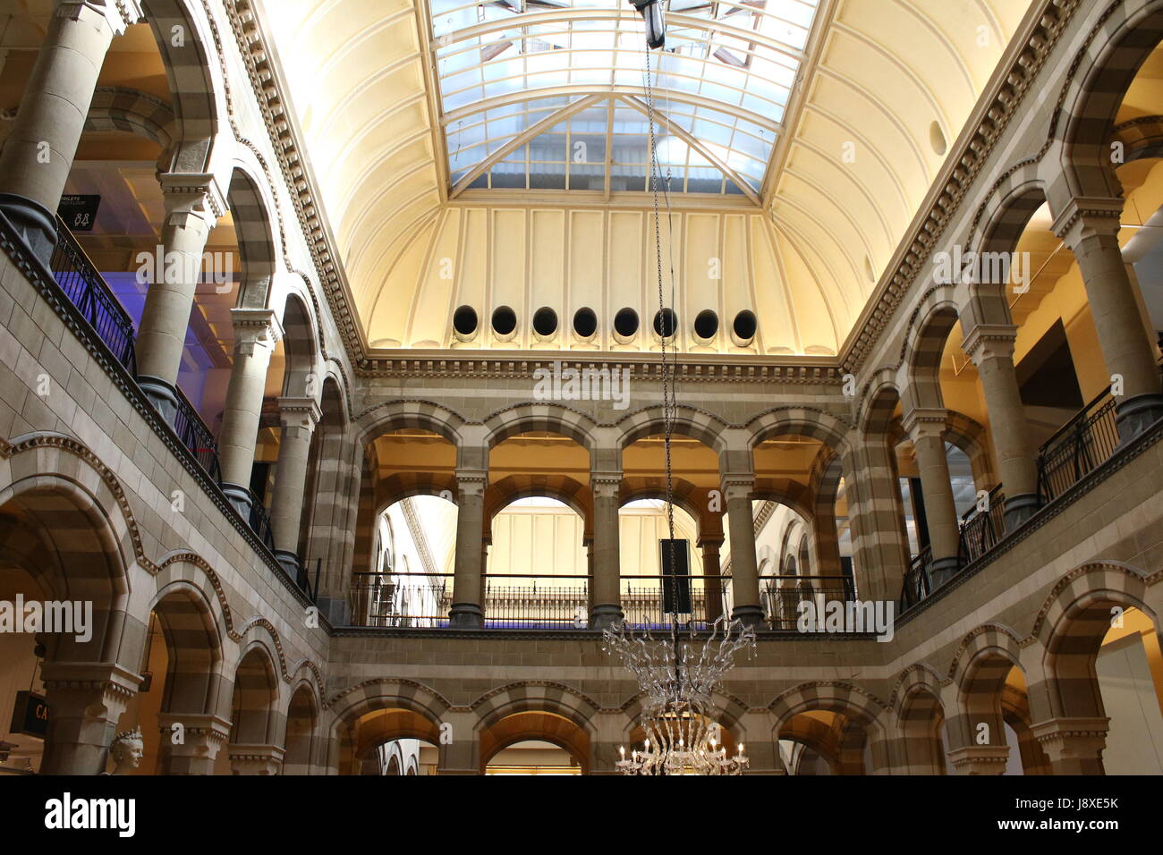 Interior of the late 19th century Neo Gothic Magna Plaza shopping mall at  Nieuwezijds Voorburgwal, Amsterdam, Netherlands Stock Photo - Alamy