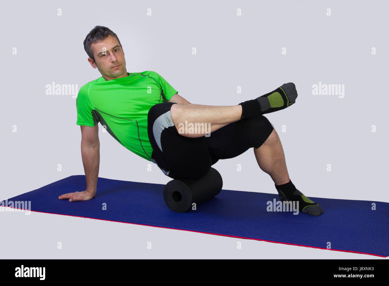 Jogging Roll exercising with a roll Stock Photo - Alamy