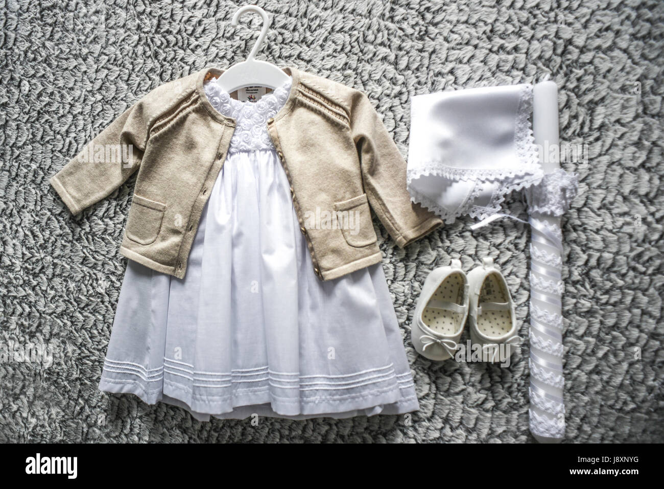 Baby clothes for baptism Stock Photo Alamy
