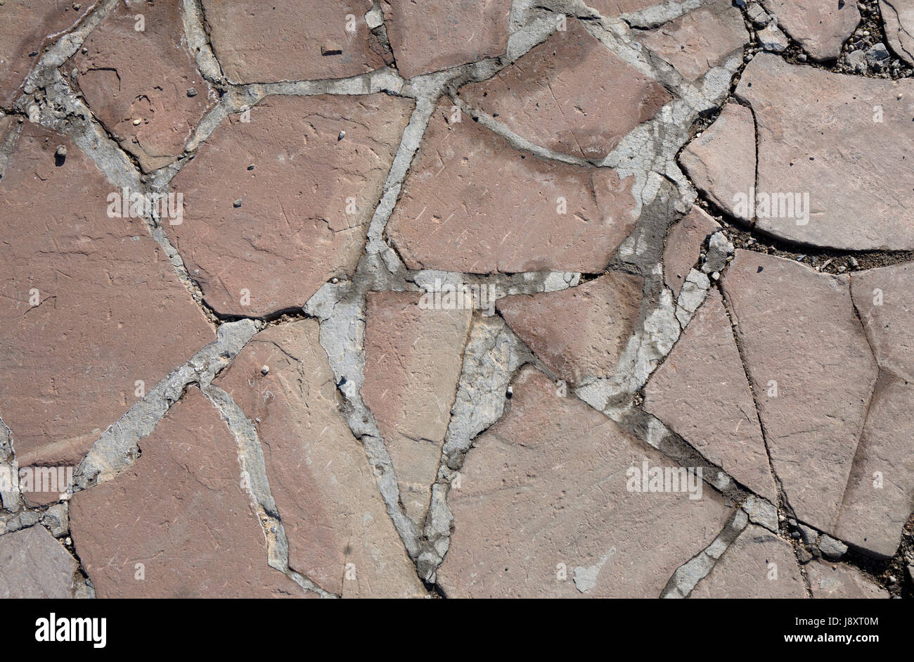 Rough texture of stone wall. Rock background Stock Photo