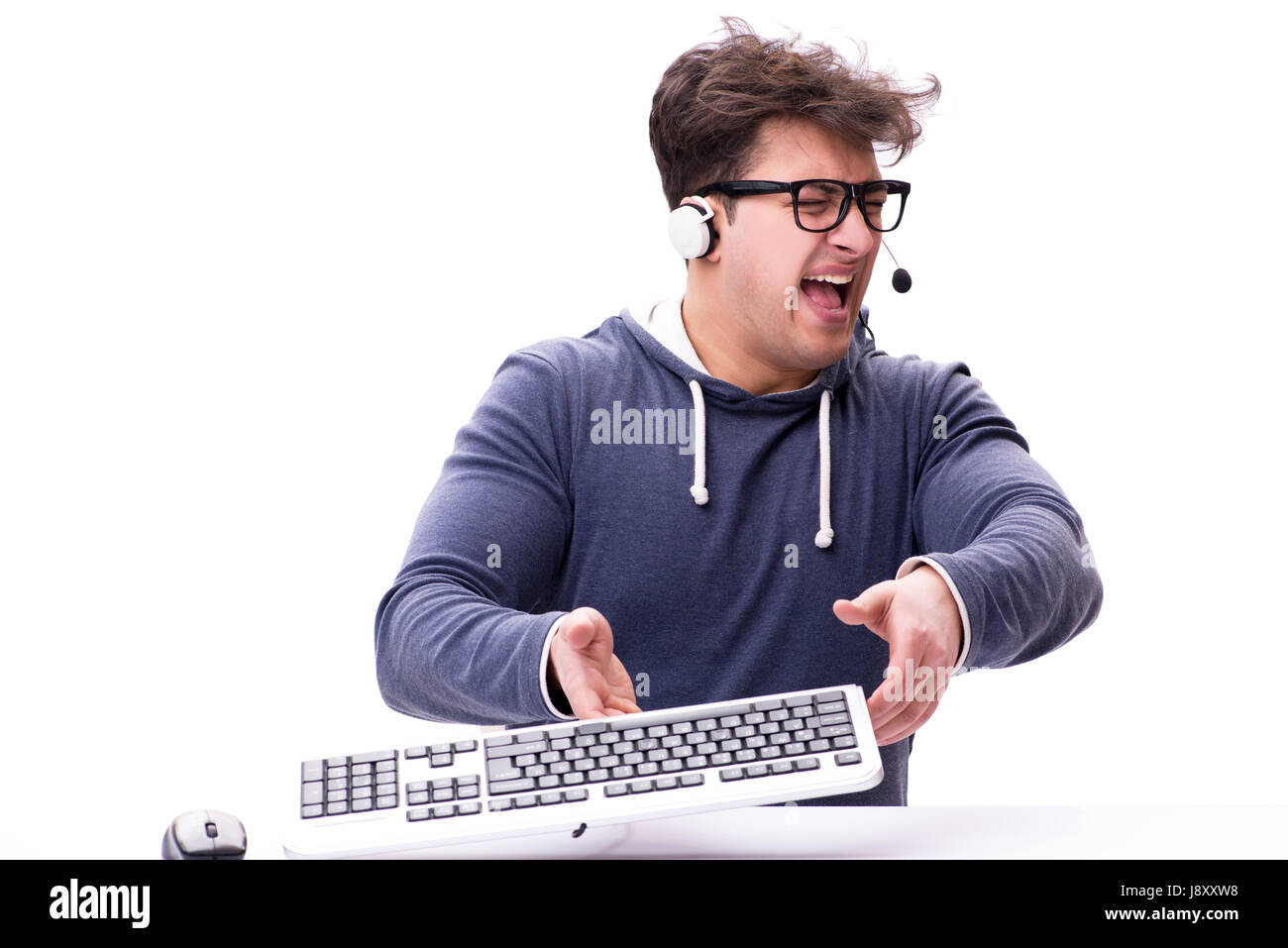 Funny nerd man working on computer isolated on white Stock Photo