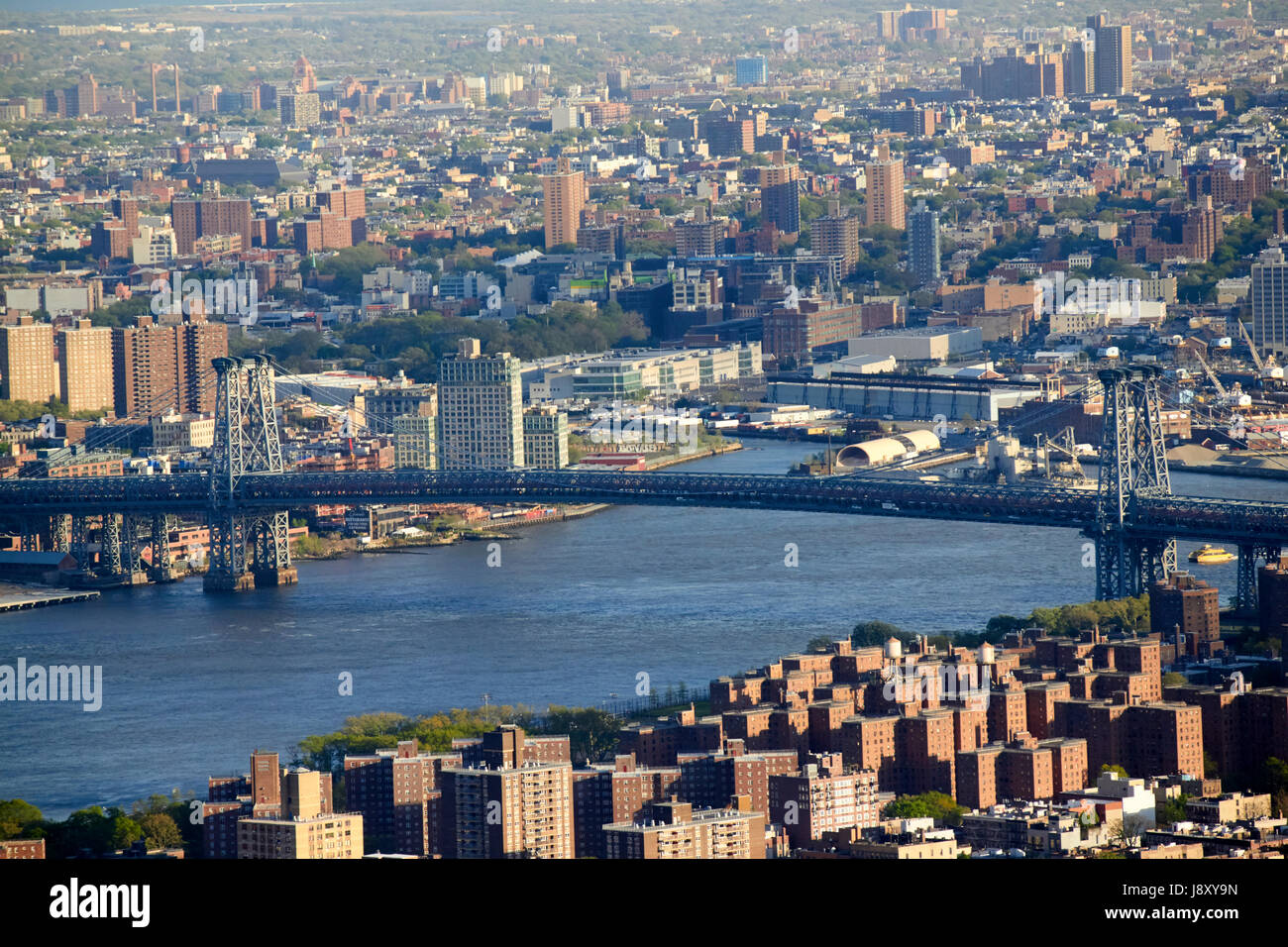 view of manhattan bridge and east river with brooklyn beyond New York City USA Stock Photo
