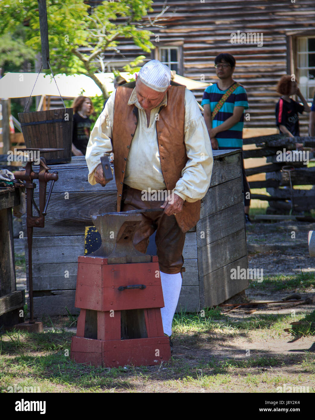 Black Smith working during US civil war reenactment Bennett Place Durham North Carolina Stock Photo