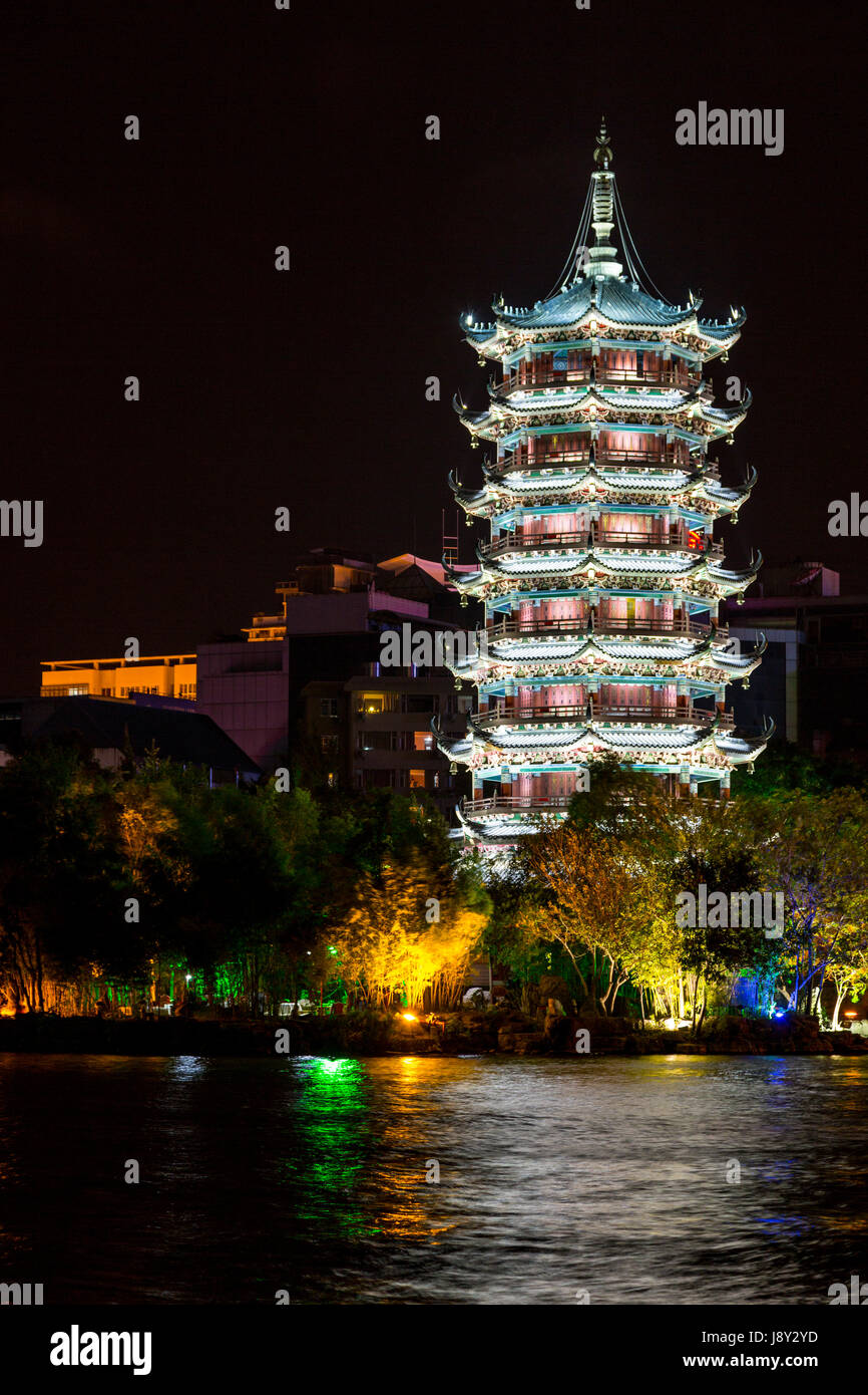 Guilin, China.  Moon Pagoda beside Shan Lake at Night. Stock Photo