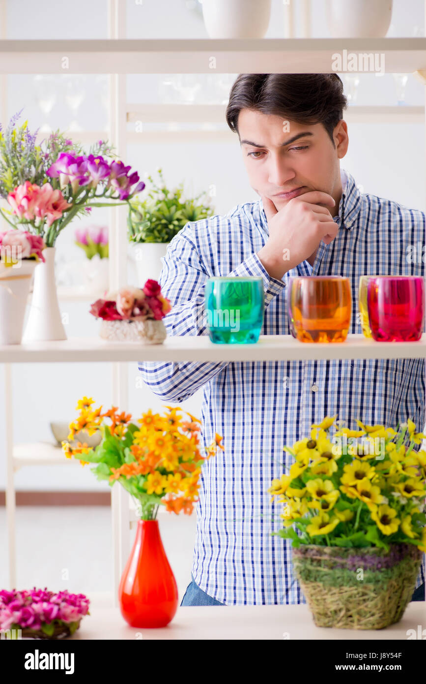 Young handsome man shopping in shop Stock Photo - Alamy