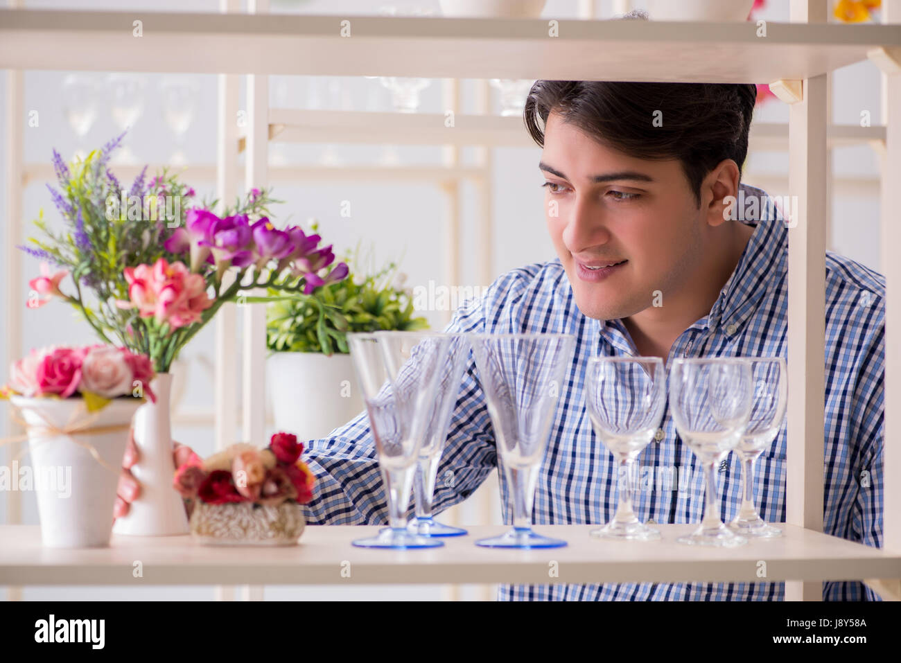 Young handsome man shopping in shop Stock Photo - Alamy