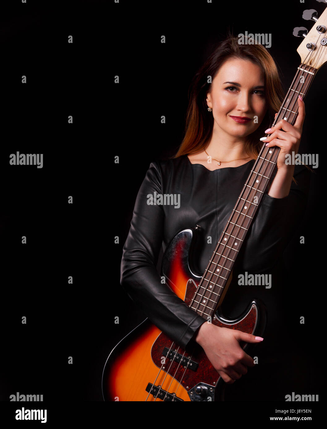 Portrait of woman with guitar Stock Photo - Alamy