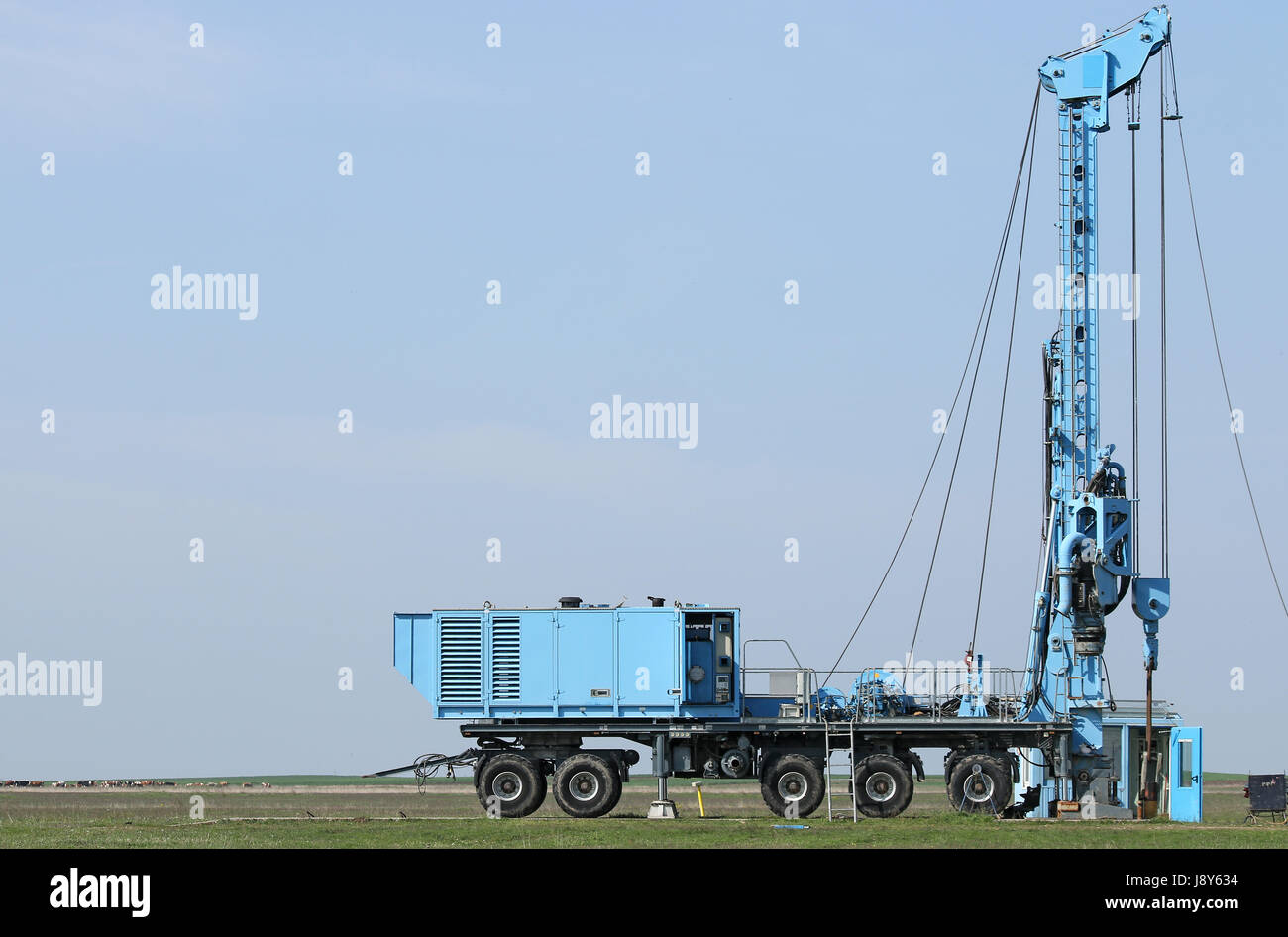 geology and oil exploration mobile drilling rig vehicle on field Stock Photo