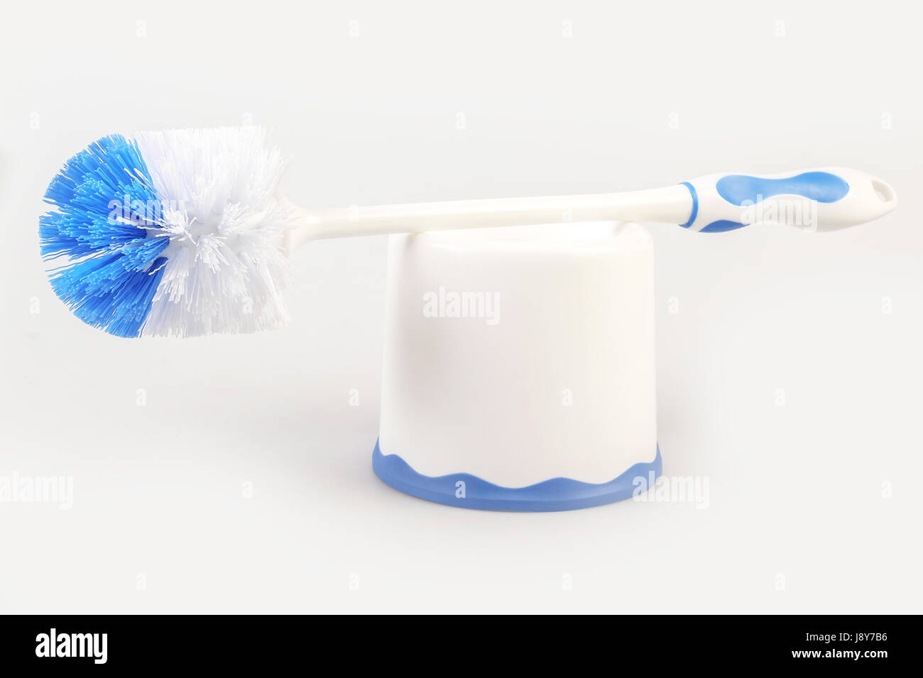 Plastic blue toilet brush isolated on white background Stock Photo