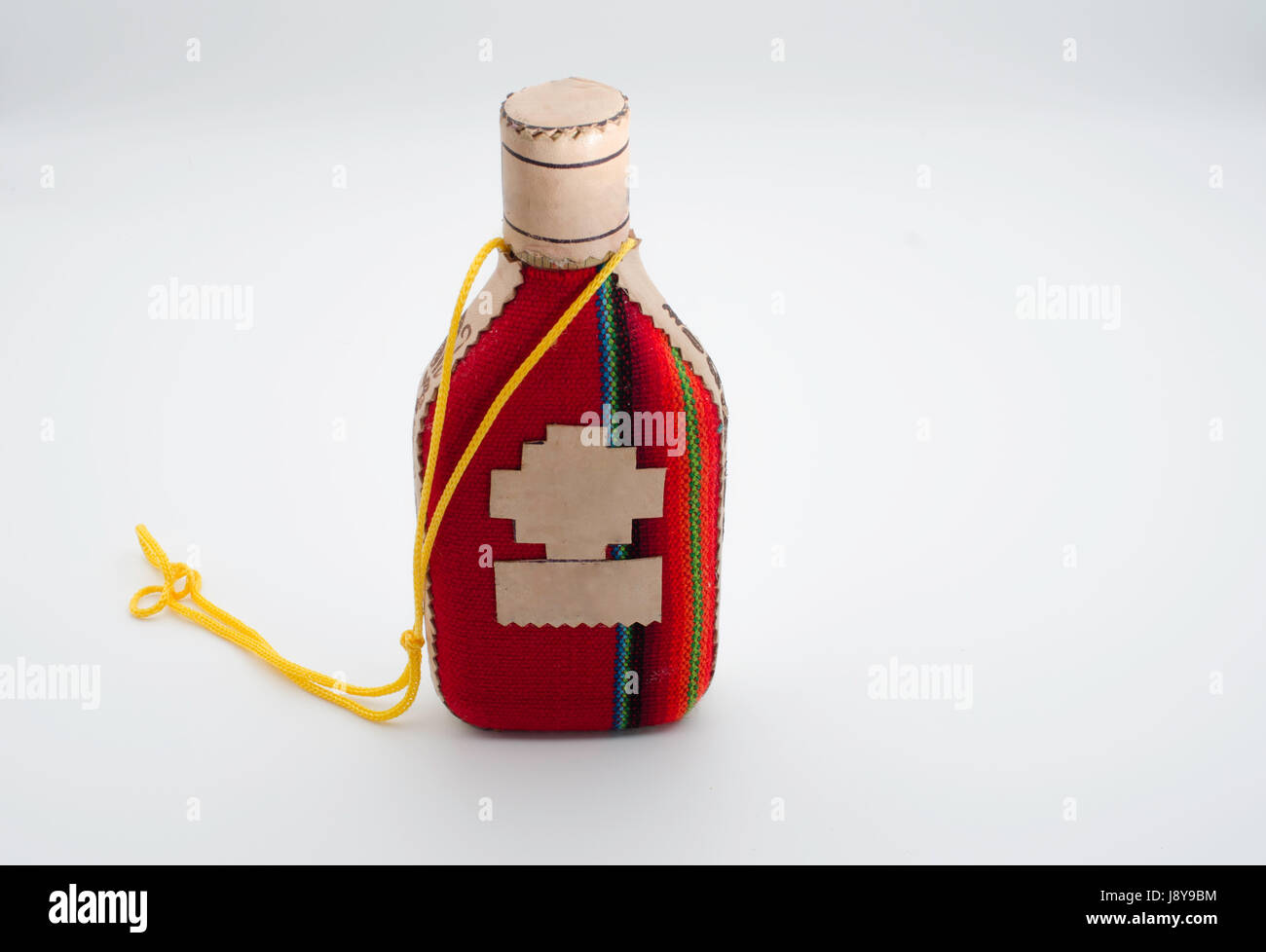 Wrapped Bottle with colorful wool Stock Photo