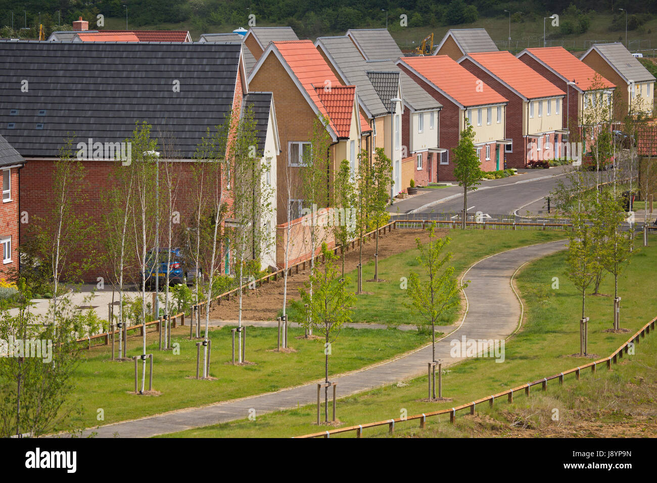 A completed new greenfield housing development with landscaping Stock Photo