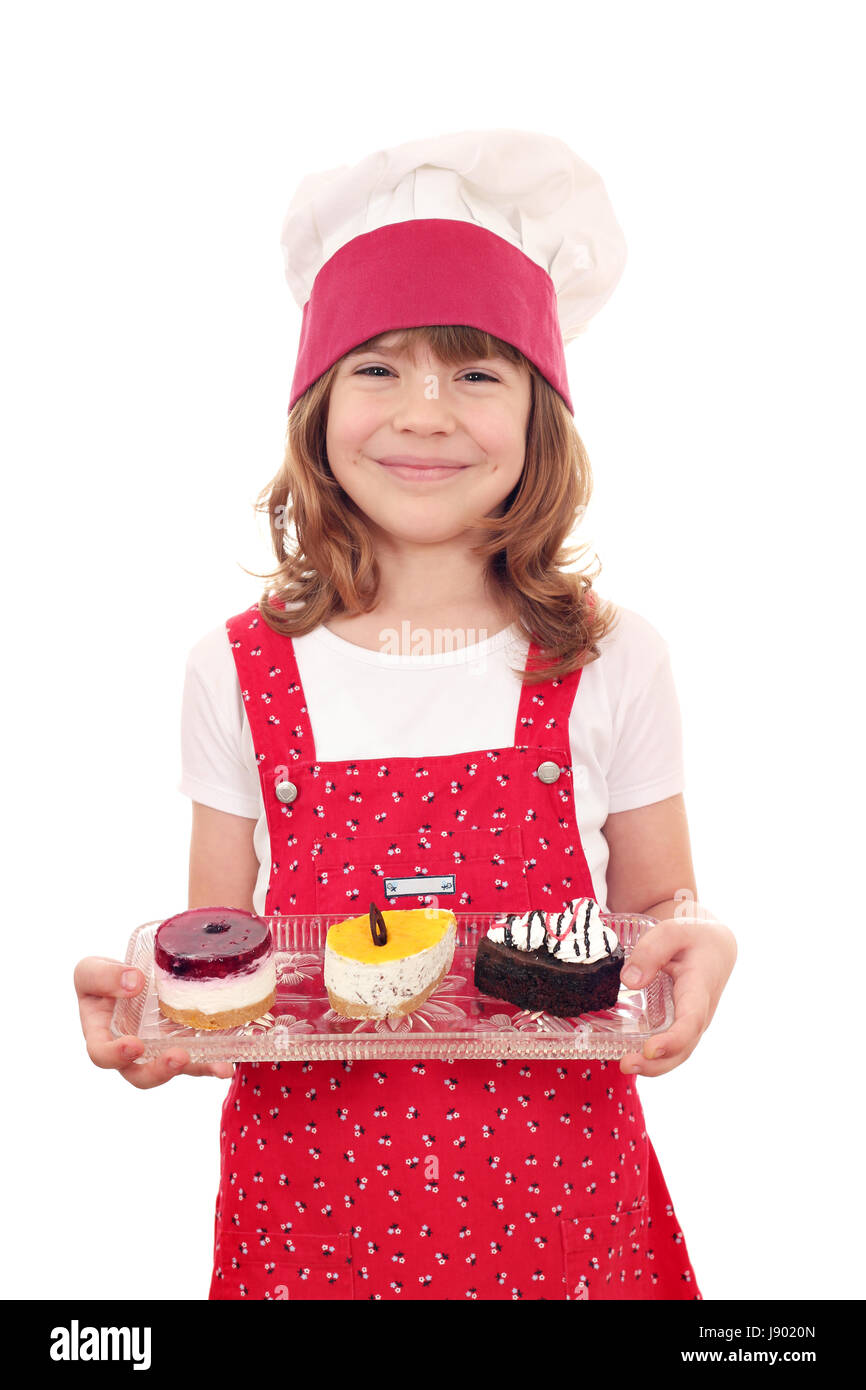 happy little girl cook with sweet cakes Stock Photo Alamy