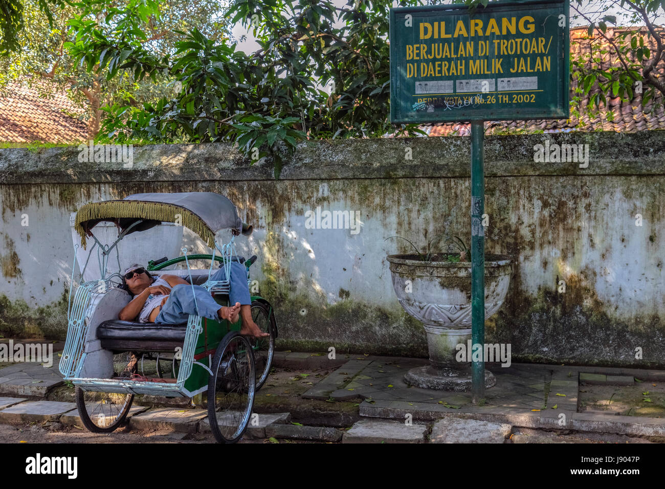 Trishaws in the streets of Yogyakarta, Java, Indonesia, Asia Stock Photo