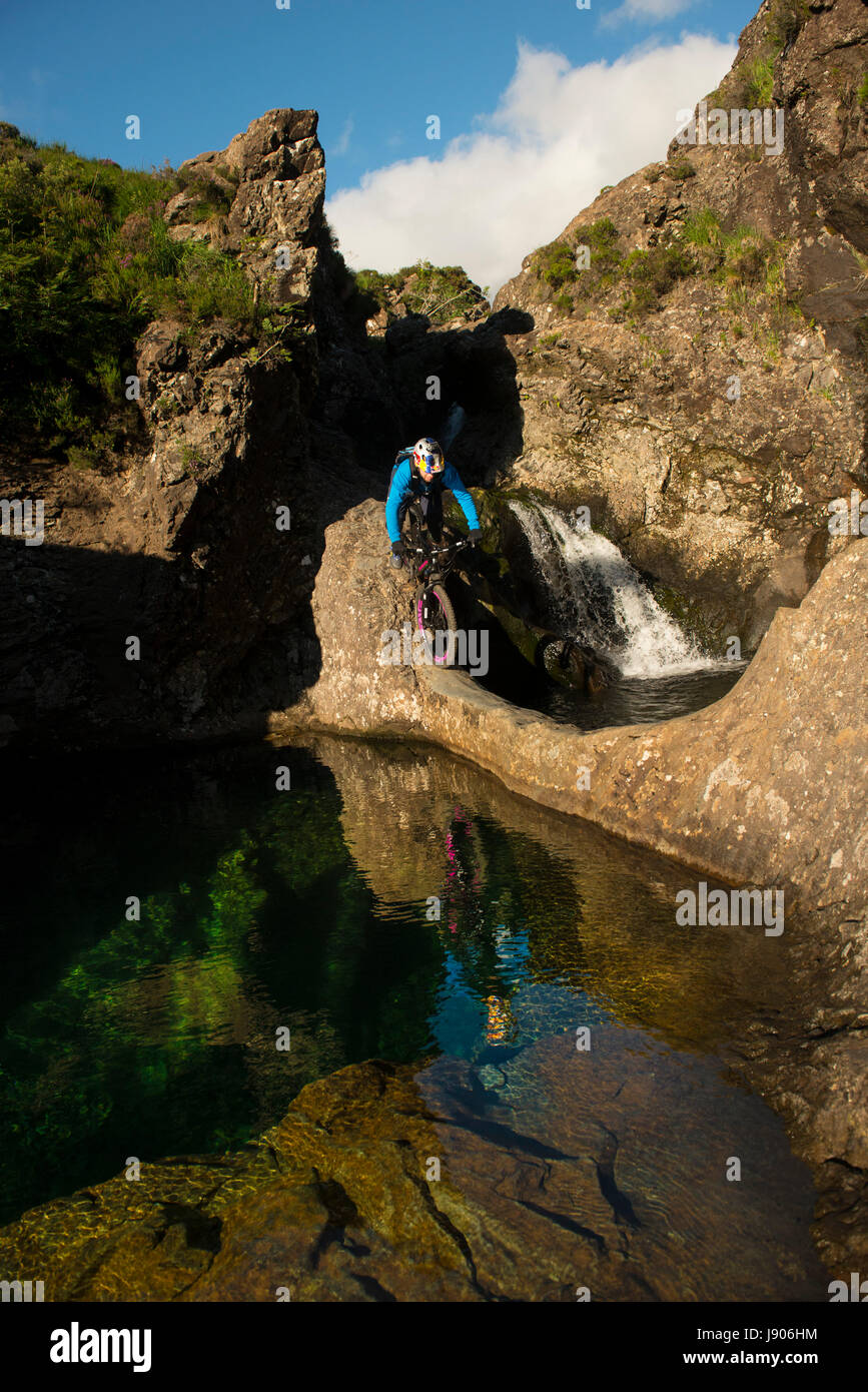 Danny MacAskill on set for The Ridge video, at the Fairy Pools in the heart of the Cuillin Mountains Stock Photo