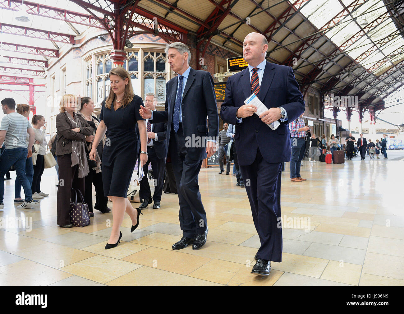 Chancellor of the Exchequer Philip Hammond with Mayor of the West of England Tim Bowles (right) and Bristol East candidate Theo Clarke (left) while campaigning at Bristol Temple Meads railway station. Stock Photo