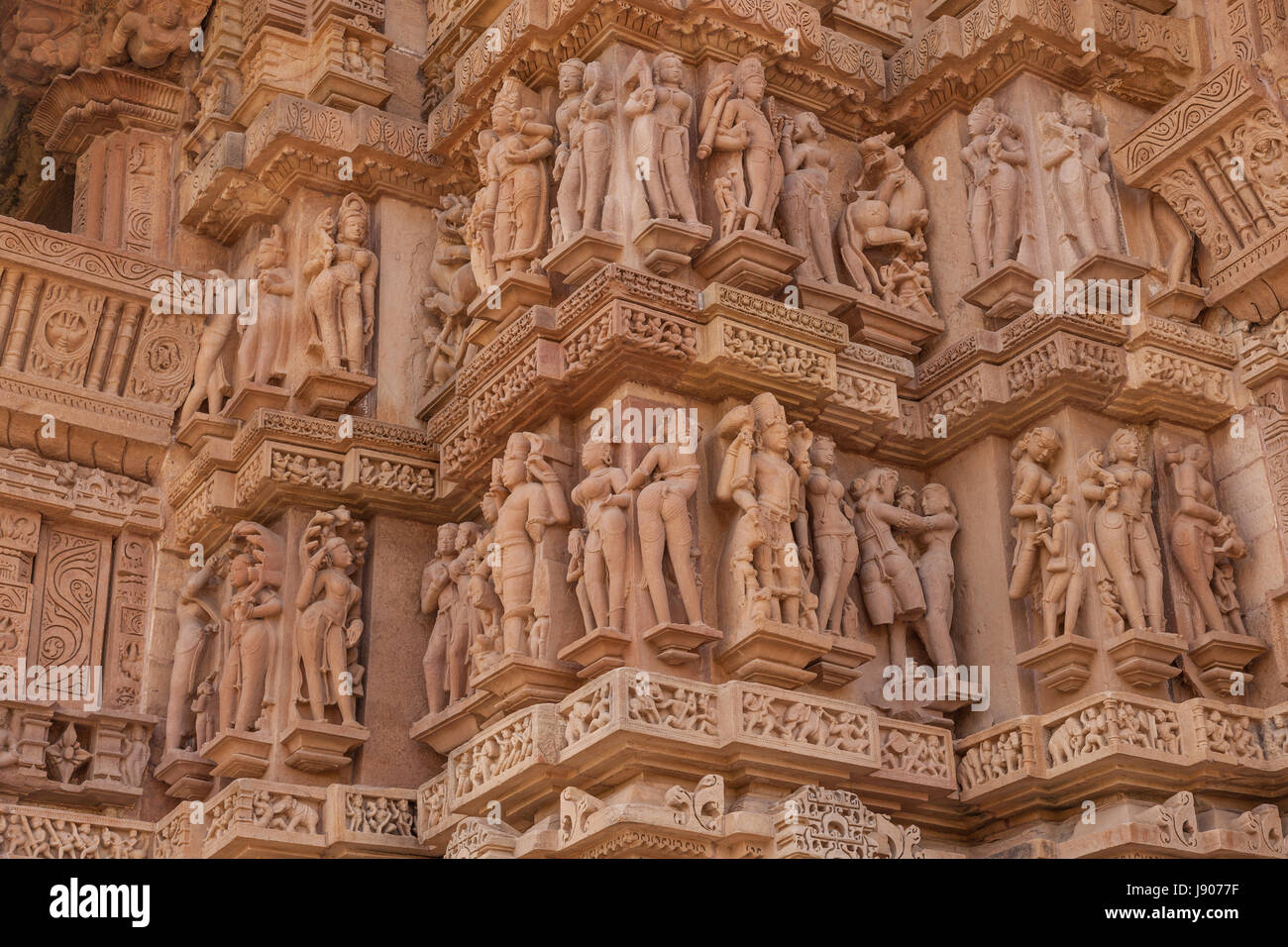 Stone carvings on Temple at Khajuraho,Orchha,Temple in India,Asia, unique Ind0-Aryan architecture,Chhatarpur of Madhya Pradesh Stock Photo